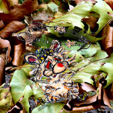 Harrison Hamster I in a pile of leaves with a sore nose